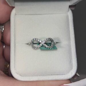 Elegant Sterling Silver Infinity Ring with Moissanite